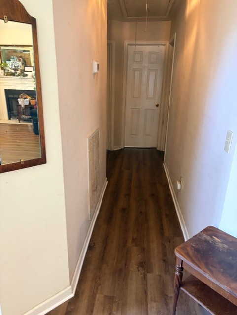 Hallway after carpet replacement with finished Luxury Vinyl Plank flooring